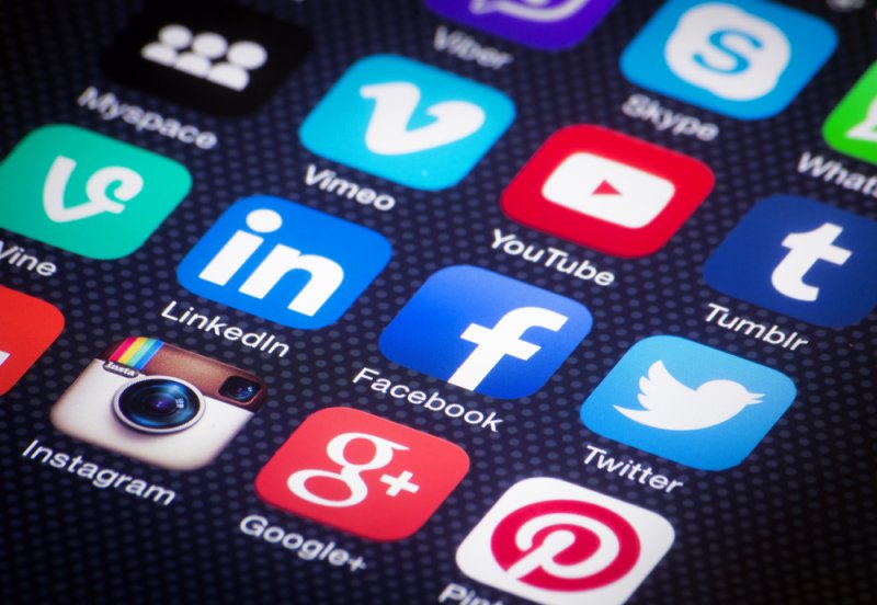 Social media mobile app icons are shown on a smartphone for social networking on the go. File Photo by Twin Design/Shutterstock