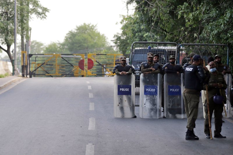 Police surrounded the home of former Pakistani Prime Minister Imran Khan on Thursday as they accused him of harboring dozens of suspects involved in violent protests that erupted in response to his arrest on corruption charges. Photo by Rahat Dar/EPA-EFE