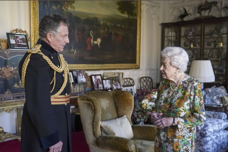 Queen Elizabeth II is seen with General Sir Nick Carter during an in-person meeting at Windsor Castle on Wednesday. Photo Courtesy of The Royal Family/Twitter