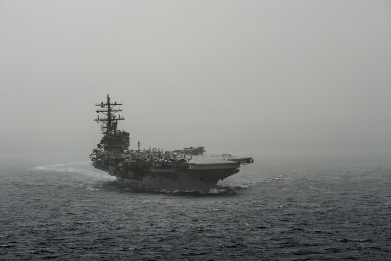 The USS Ronald Reagan patrols with the U.S. Seventh Fleet in the South China Sea in July. The Philippine defense secretary said Thursday it's highly unlikely his country will allow the U.S. military to use its bases to navigate in the South China Sea. Photo by U.S. Navy/Mass Communication Specialist 3rd Class Nathan Burke