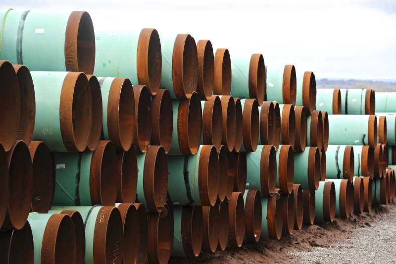 A file photo from 2012 shows piping to be used for the Keystone XL pipeline from Cushing, Okla., to the Gulf of Mexico stacked at a storage yard in Oklahoma. File Photo by Larry W. Smith/EPA