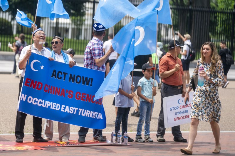 Uyghur activists rally against China's human rights violations and the occupation of East Turkistan during a protest in Lafayette Park across the street from the White House in Washington, D.C., in July 2022. File Photo by Shawn Thew/EPA-EFE