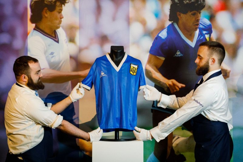 Soccer: Maradona's 'Hand of God' World Cup jersey sells for record $9.2M