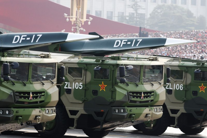 Military vehicles carrying the DF-17 hypersonic ballistic missile roll past Tiananmen Square during a military parade marking the 70th anniversary of the founding of the People's Republic of China, in Beijing in 2019. It now boasts a new model, the DF-27. File Photo by Roman Pilipey/EPA-EFE