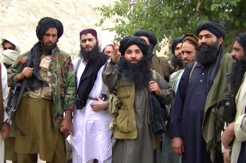 Pakistan's Taliban named a successor on Saturday to replace its leader killed in a drone strike last week. A video taken from an undated video released by Pakistani Taliban shows its head Fazlullah (C) at an undisclosed location at Pak-Afghan border. Photo by EPA/TTP
