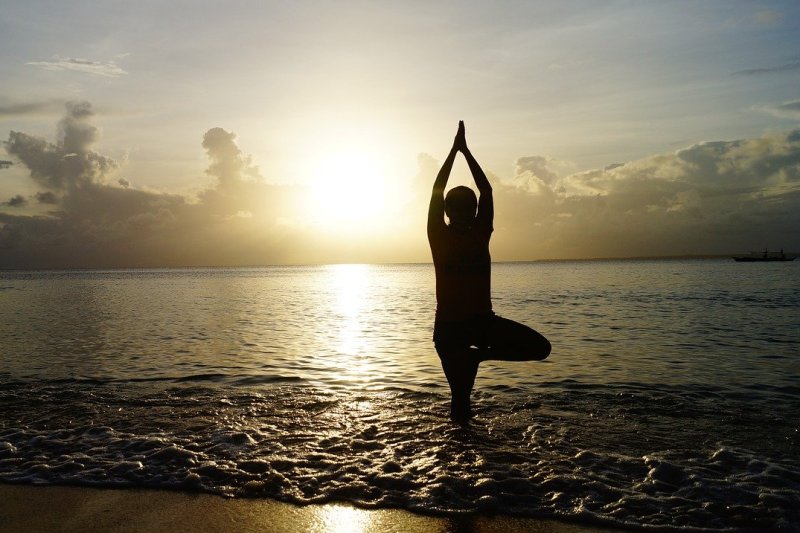 In a recent study, the proportion of deaths among those who failed a test to stand on one leg for 10 seconds was almost 13% higher than those who passed. Photo by Pexels/<a href="https://pixabay.com/photos/beach-sunset-yoga-meditate-1835213/">Pixabay</a>