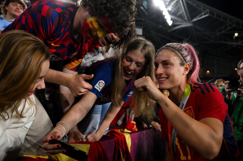 Alexia Putellas of Spain celebrates with fans after winning the FIFA Women's World Cup 2023 Final soccer match between Spain and England at Stadium Australia in Sydney, Australia, on Aug. 20. File Photo by Dean Lewins/EPA-EFE