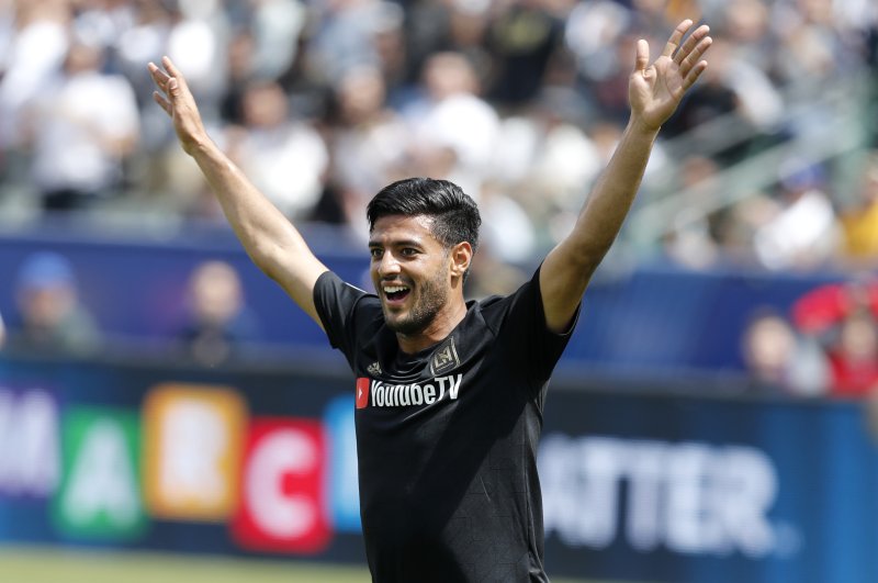 LAFC and striker Carlos Vela will be in a group with&nbsp;the LA Galaxy, Houston Dynamo and Portland Timbers FC&nbsp;for the MLS is Back Tournament this summer in Orlando, Fla. Photo by Paul Buck/EPA-EFE