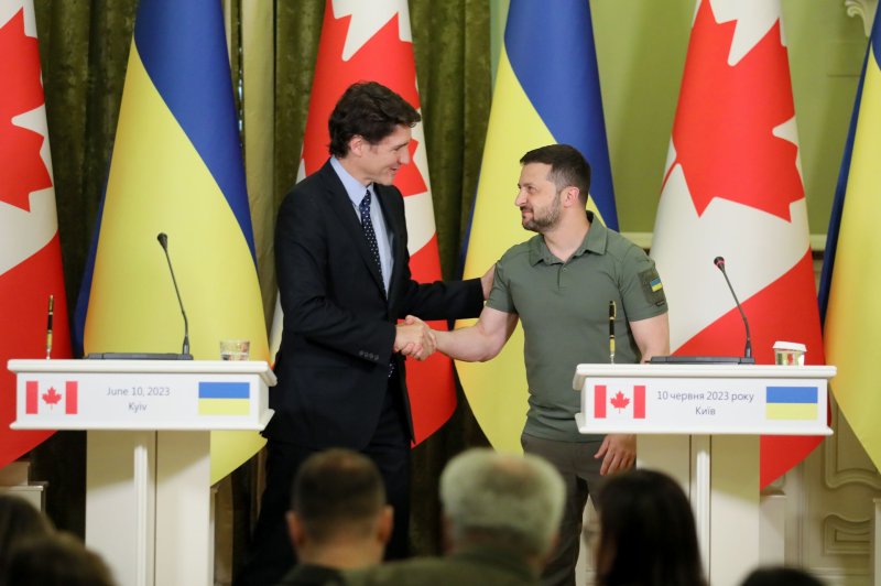 Ukraine's President Volodymyr Zelensky (R) and Canada's Prime Minister Justin Trudeau shake hands during a press conference in Kyiv, Ukraine, Saturday amid the Russian invasion. Photo by Oleg Petrasyuk/EPA-EFE