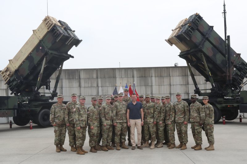 Visiting U.S. Secretary of the Army Eric Fanning (C) poses with U.S. soldiers at the 35th Air Defense Artillery Brigade of the U.S. Forces Korea's Eighth Army in Osan, near Seoul, on August 2, 2016. The Pentagon said Ukrainian soldiers are wrapping up their training on the Patriot missiles systems early on Tuesday. File Photo by Yonhap News Agency/UPI