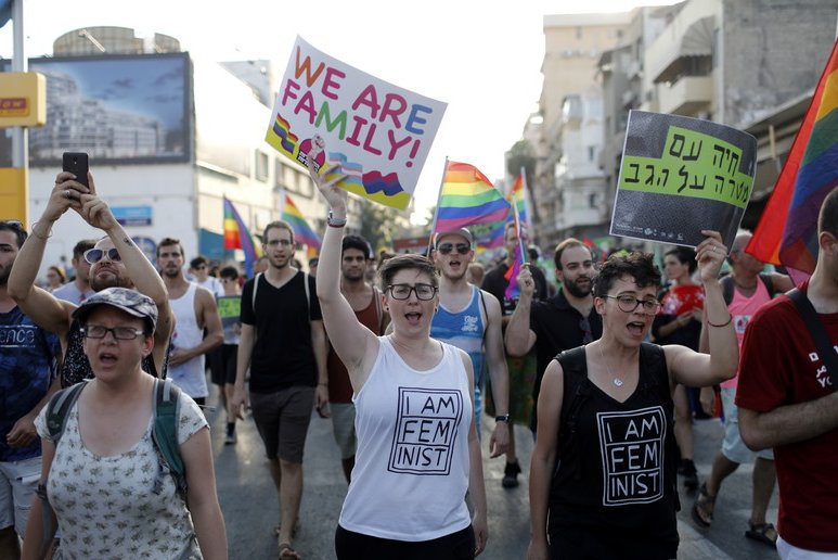 Activists attend a demonstration for LGBT rights in Tel Aviv, Israel. The country's health ministry said Tuesday that same-sex couples can pursue parental surrogacy. File Photo by Abir Sultan/EPA-EFE