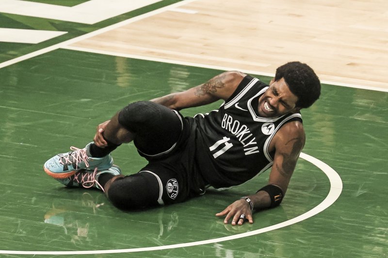Brooklyn Nets guard Kyrie Irving injured his ankle during the second quarter of the Nets' Game 4 loss to the Milwaukee Bucks in June 2021 at Fiserv Forum in Milwaukee. File Photo by Tannen Maury/EPA-EFE