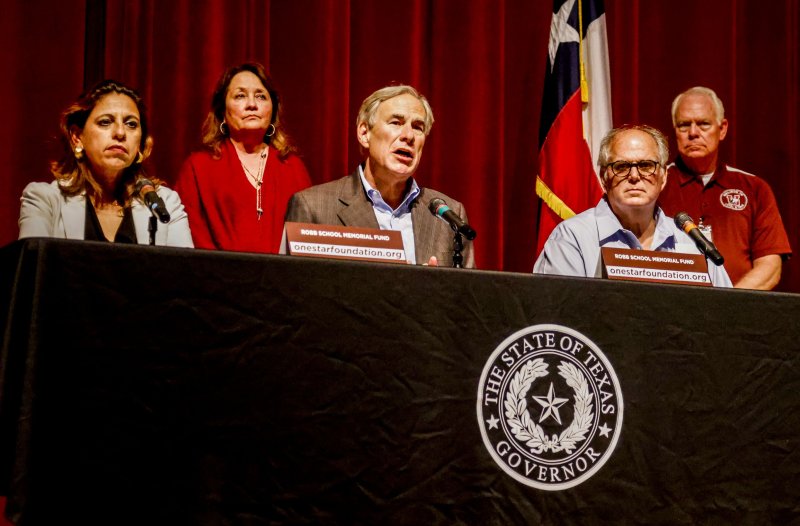 Texas Gov. Greg Abbott (C) gives updates on social services available to victims' families following the mass shooting at Robb Elementary School in Uvalde, Texas, on Friday. File Photo by Tannen Maury/EPA-EFE