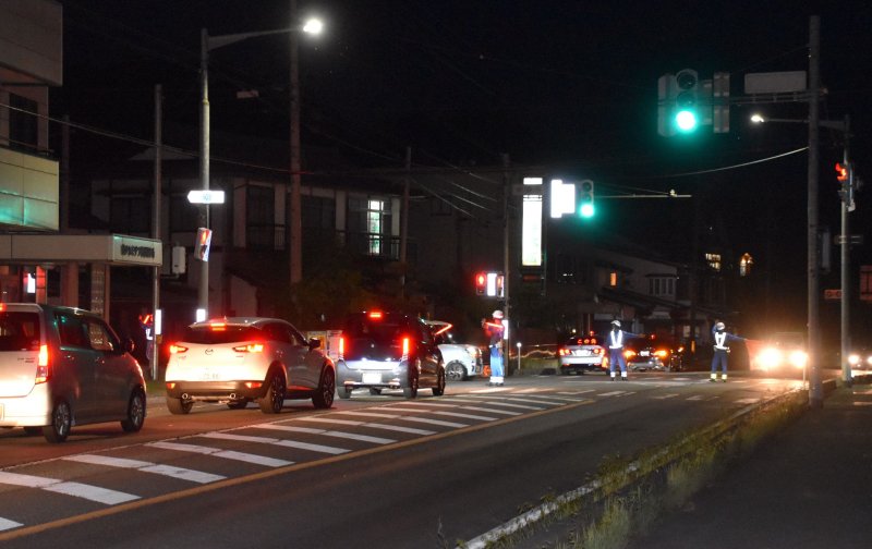 Police blocked access to an area in Nagano, Japan, Thursday after a man killed three people, including two police officers, and injured one more in a knife and gun attack before hiding in a building. Photo by Jiji Press Japan/EPA-EFE