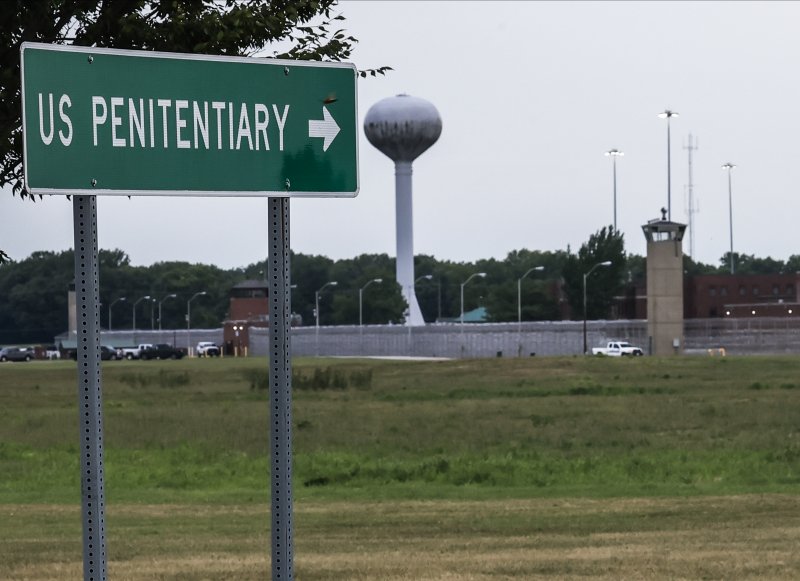 A sign points to the Federal Correctional Complex, where the federal execution chamber is located, in Terre Haute, Ind., on July 15. Inmate Orlando Hall is scheduled to die there on Thursday. File Photo by Tannen Maury/EPA-EFE