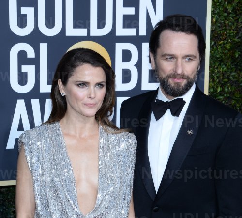 Keri Russell and Matthew Rhys attend Golden Globe Awards