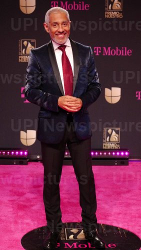 Néstor Torres walks the Red Carpet at Premio Lo Nuestro Award Show in Miami, Florida