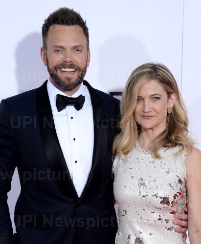 Joel McHale and Sarah Williams attend the 43rd annual People's Choice Awards in Los Angeles